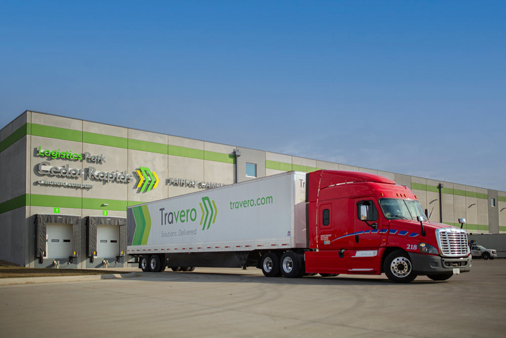 Travero semi in front of a warehouse