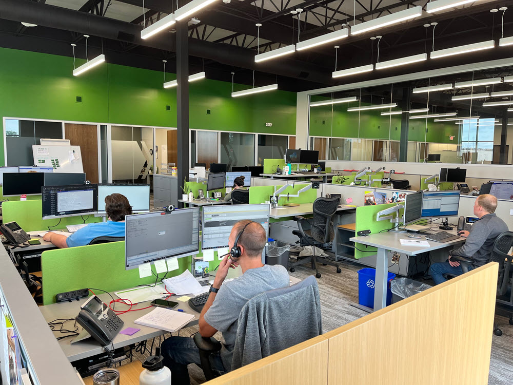 employees of Travero working at their office