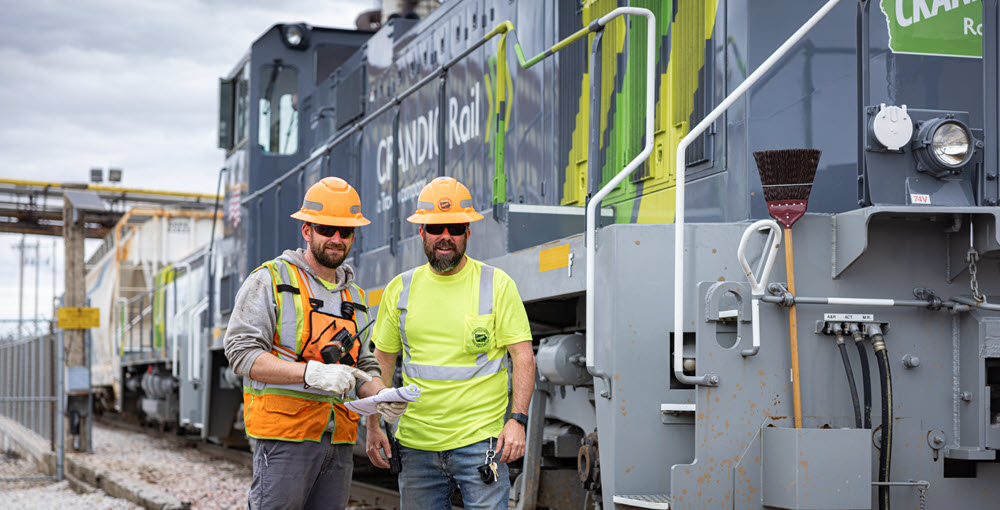 CRANDIC employees in front of a train