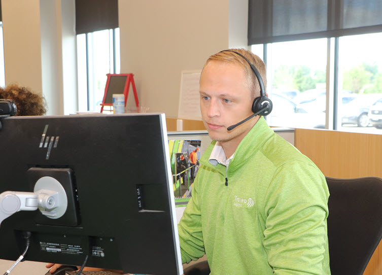 Travero employee on phone