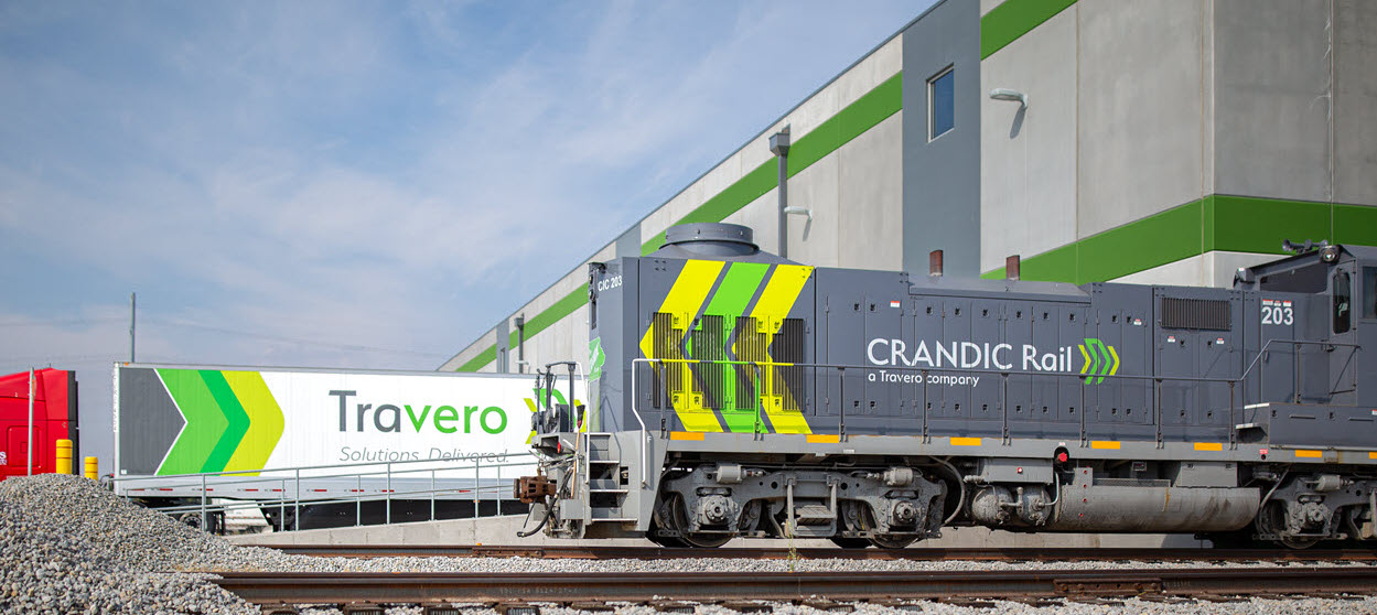 A Travero semi and a CRANDIC locomotive