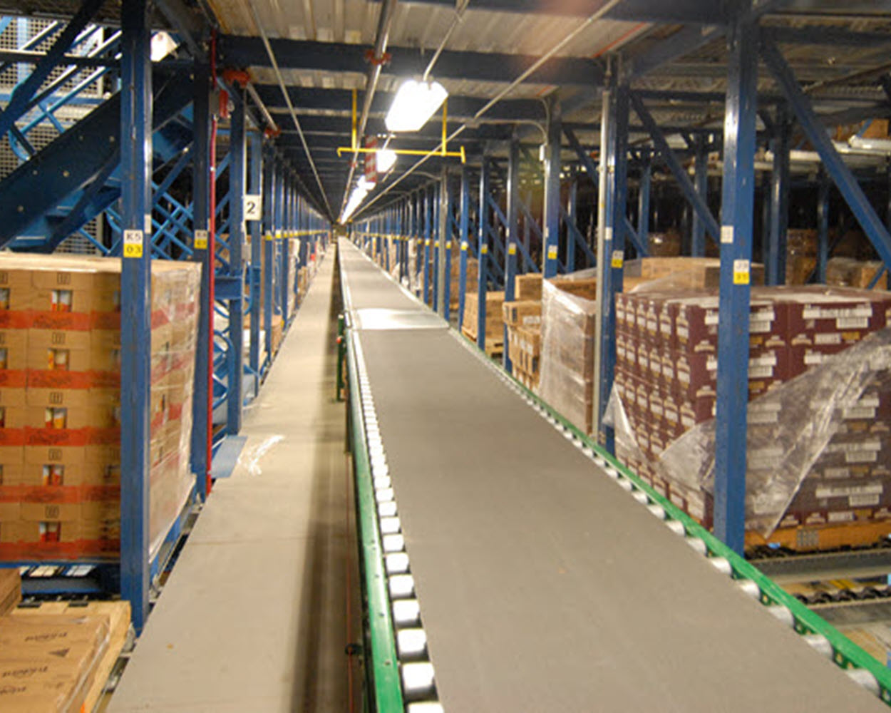 Boxes and a conveyor belt in a facility